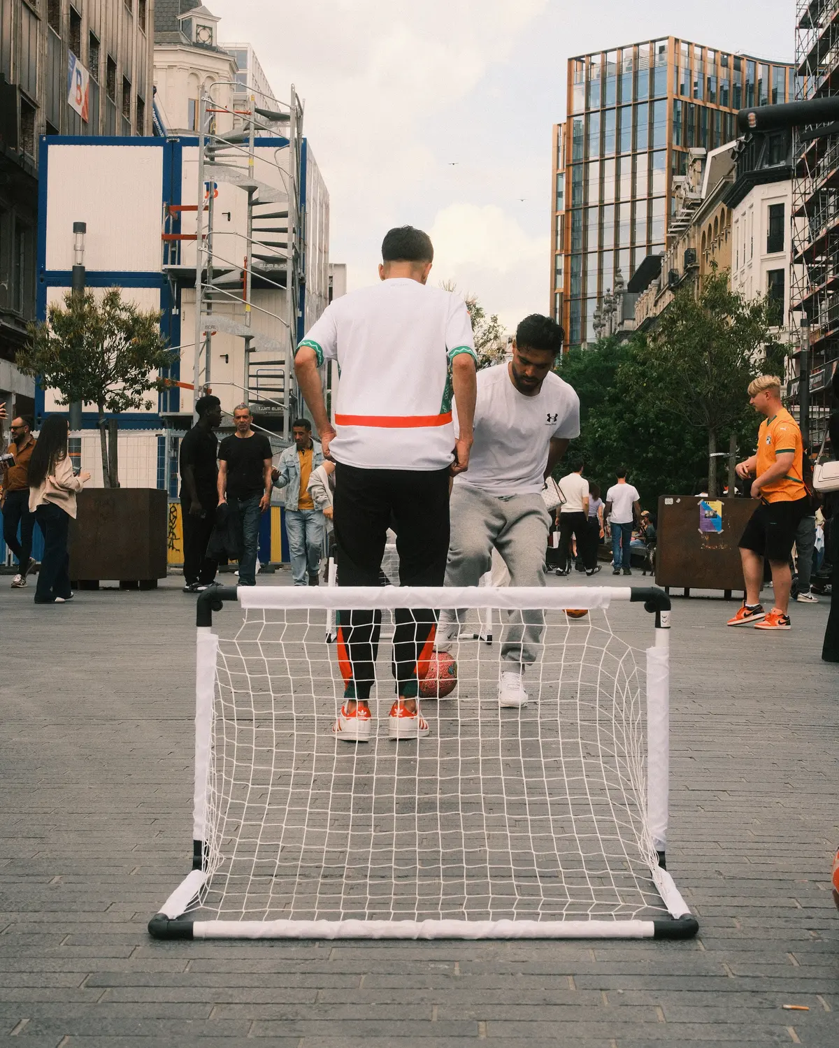 An improvised football match in a square in Brussels